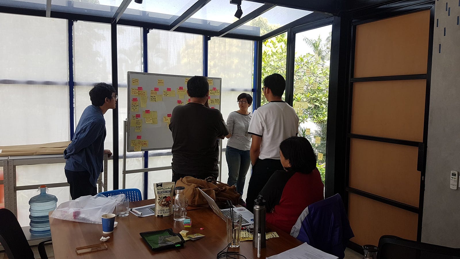 Team members contributing ideas during the Gordi Value Proposition Canvas workshop